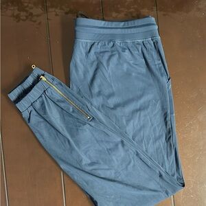 ZYIA Women’s Teal Peak Joggers with Gold Zipper